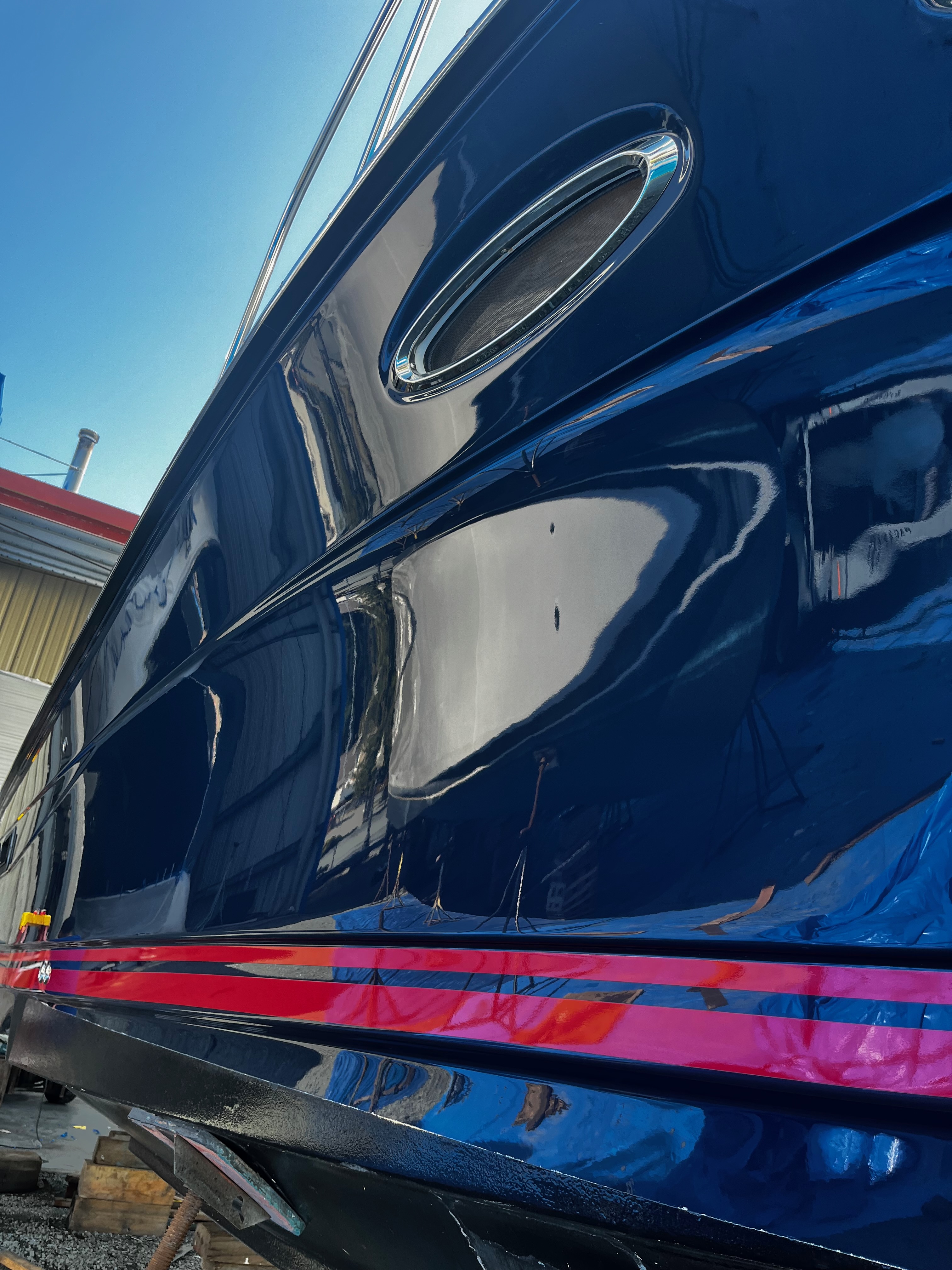 Finished coated hull, gloss held at the waterline, Essential Shipyard