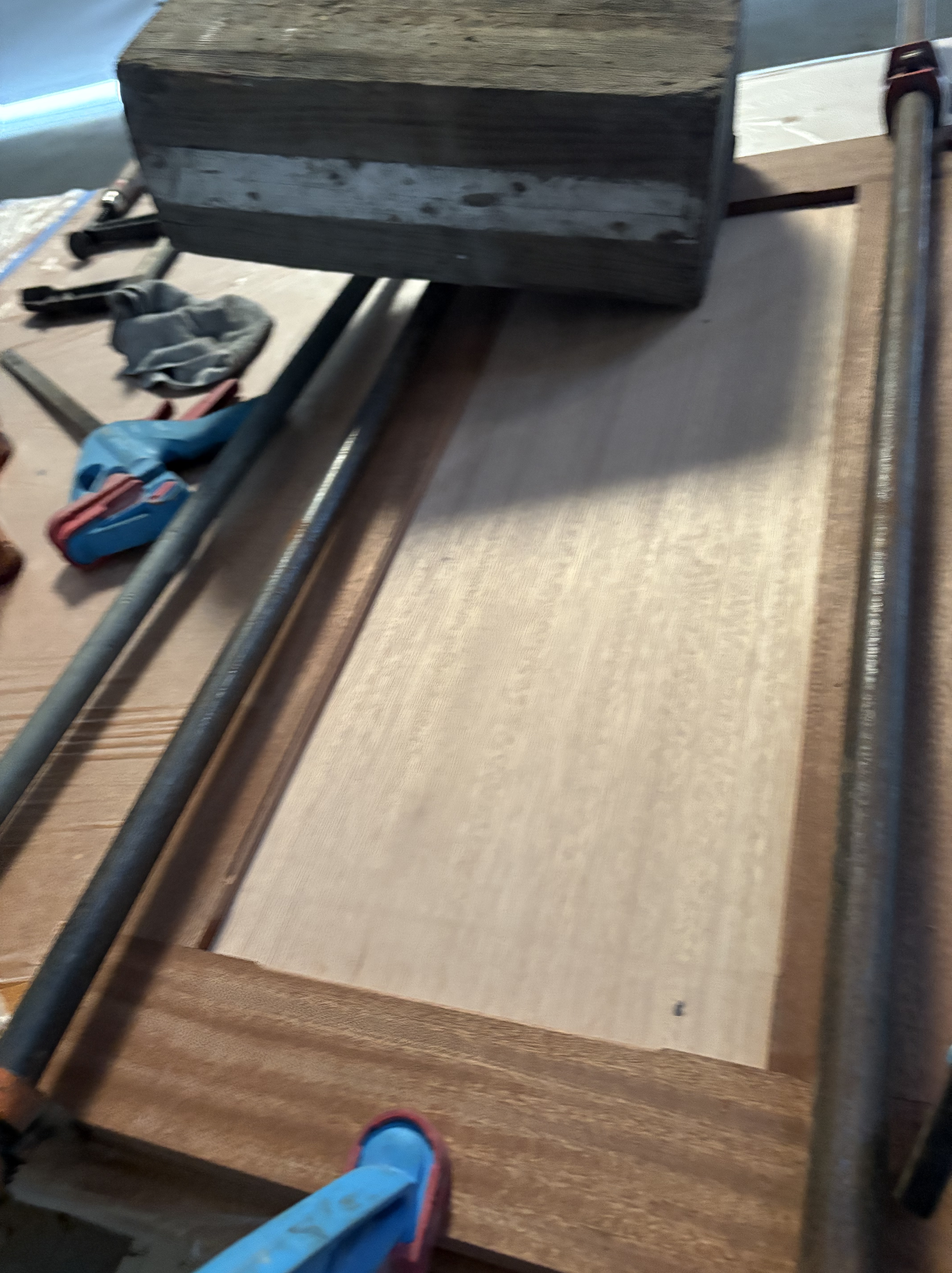 Hardwood panel clamped up in the Essential Shipyard cabinet shop